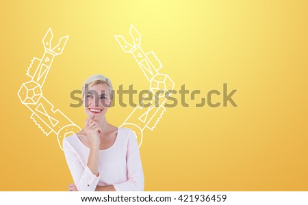 Attractive blonde woman looking away against yellow vignette
