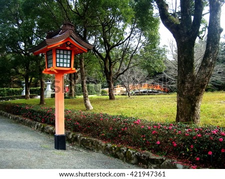 A wooden red lantern is a sign of temple area. It often places at the entrance of every temples.