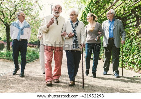 Group of old people walking outdoor Royalty-Free Stock Photo #421952293