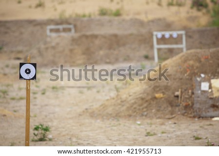 Targets on outdoor shooting range close up Royalty-Free Stock Photo #421955713