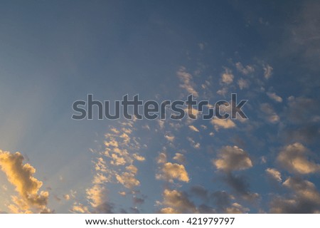 Evening sky with colored clouds for background