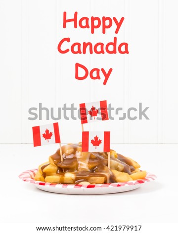 Plate of poutine, a unique Canadian fast food originating from the province of Quebec.