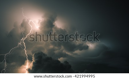 Thunderstorm Clouds with Lightning Royalty-Free Stock Photo #421994995