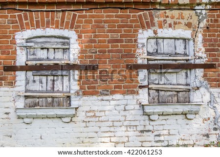 Close up of window with wooden shutter