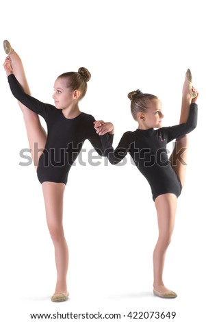 Girls doing gymnastic exercises or exercising on white background