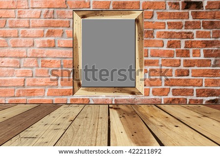photo frame on brick wall