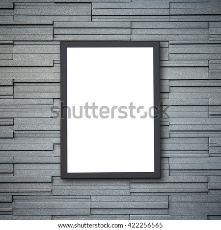 Blank of wooden photo frame on stone wall background 
