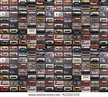 Huge collection of audio cassettes. Retro musical background Royalty-Free Stock Photo #422265142