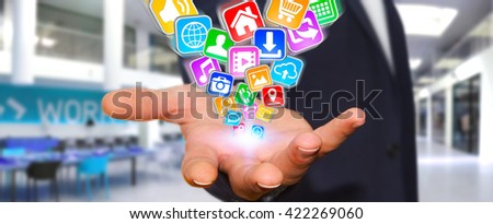 Businessman with applications icons flying over his hand '3D rendering'