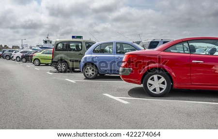 Cars parked in the parking lot. Close-up. Royalty-Free Stock Photo #422274064