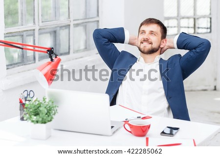 The male office worker resting