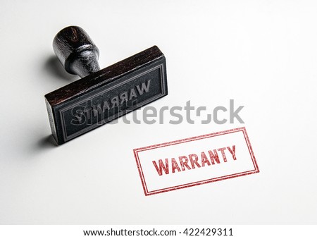 Rubber stamping that says 'Warranty'. Royalty-Free Stock Photo #422429311