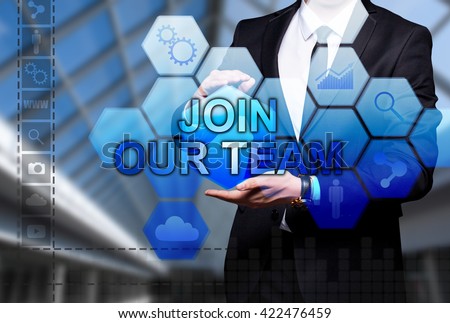 Glowing text "Join Our Team" in the hands of a businessman. Business concept. Internet concept.