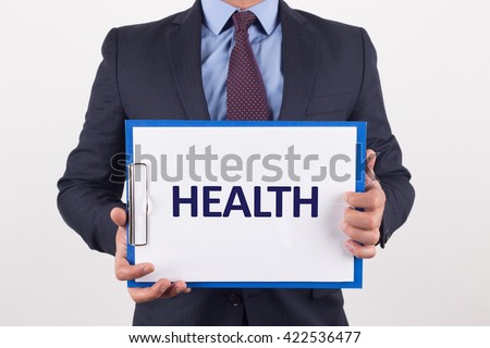 Man showing paper with HEALTH text