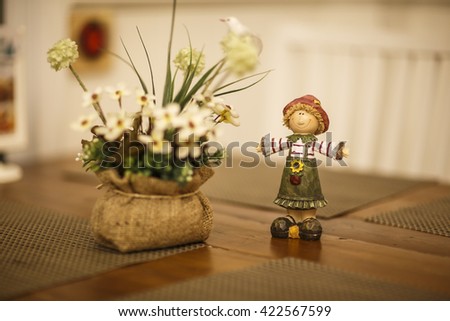Lovely doll with flower