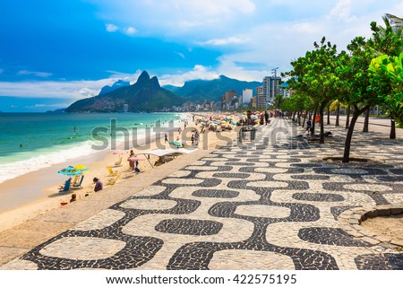 Ipanema beach with mosaic of sidewalk in Rio de Janeiro. Brazil Royalty-Free Stock Photo #422575195