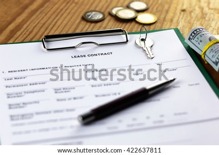 lease agreement money on wood table