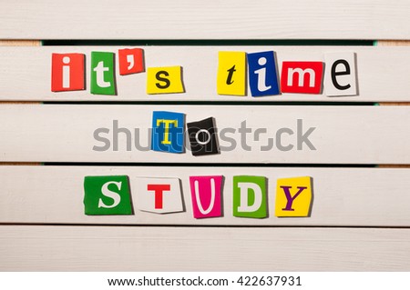 It's time to sudy - written with color magazine letter clippings on wooden board. Concept  image