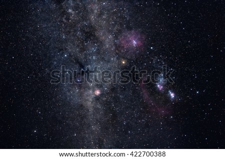 Deep space image containing constellations Orion, Monoceros, Gemini and many bright nebulae and star clusters Royalty-Free Stock Photo #422700388