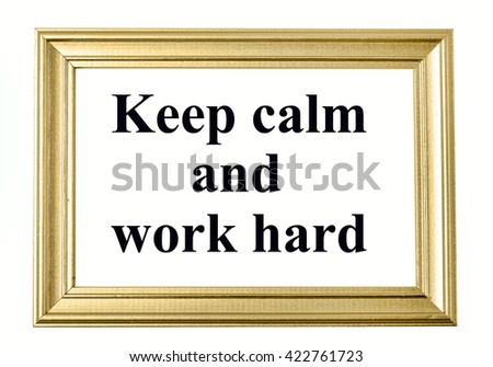 The words Keep calm and work hard on photo frame