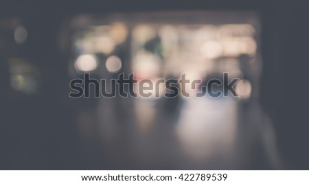 Blur image of corridor and people at modern office entrance for background usage .