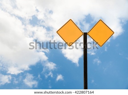 Empty street sign with sky and clouds