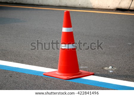 A road cone on the road