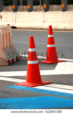 A road cone on the road