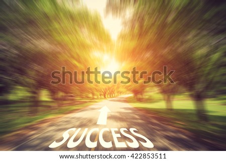 Empty blur asphalt road and sunlight and sign which symbol success. Concept for success.vintage color