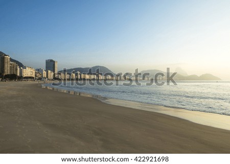 Scenic golden sunrise at Copacabana Beach in Rio de Janeiro, Brazil, before the crowds wake up