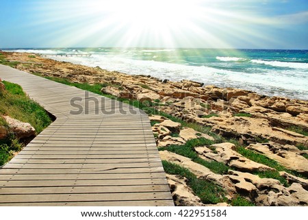 Road to the beach with rocks landscape