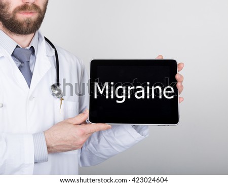 technology, internet and networking in medicine concept - Doctor holding a tablet pc with autism sign. Internet technologies in medicine