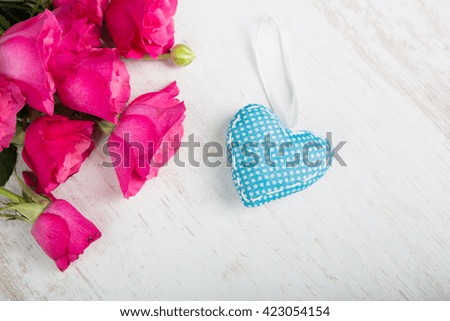 Rose bouquet on a wooden table