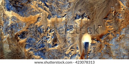 the light bulb,tribute to tesla, abstract photography of the deserts of Africa from the air. aerial view of desert landscapes, Genre: Abstract Naturalism, from the abstract to the figurative, 