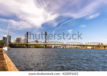 View of the Hawthorne Bridge from a pier in downtown Portland, Oregon