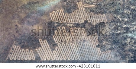 tattooing the earth, abstract photography of the deserts of Africa from the air. aerial view of desert landscapes, Genre: Abstract Naturalism, from the abstract to the figurative, contemporary photo a