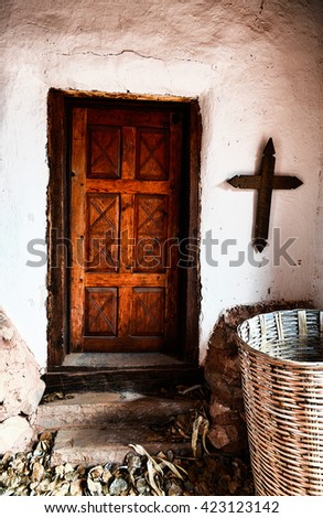 Wooden Door in Adobe Home
