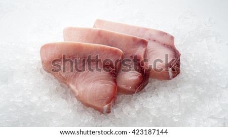 Swordfish steaks Royalty-Free Stock Photo #423187144