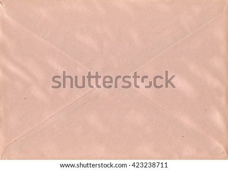 Pink paper envelope.