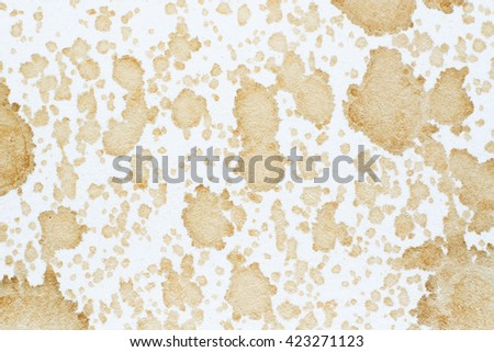 Drop stain of coffee on white paper background