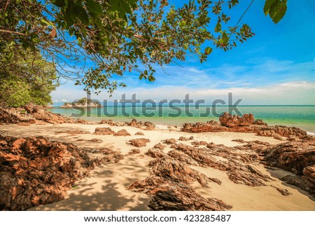 Beautiful beach with blue sky background on sunny day.