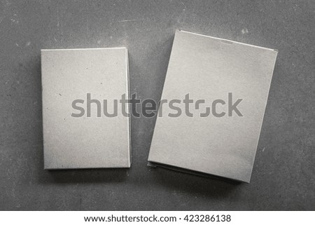 Two boxes on a gray background
