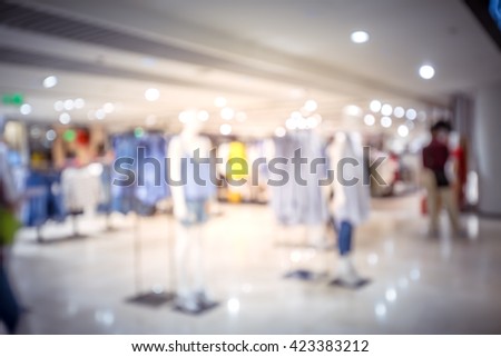 Blurred shopping mall background with vintage color tune