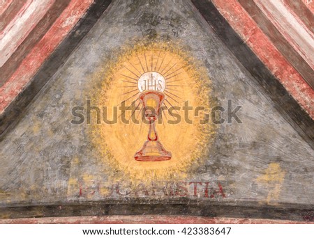 A fresco depicting the sacred chalice of Jesus. "Eucaristia" in Italian means: Eucharist, Holy Communion, Communion.