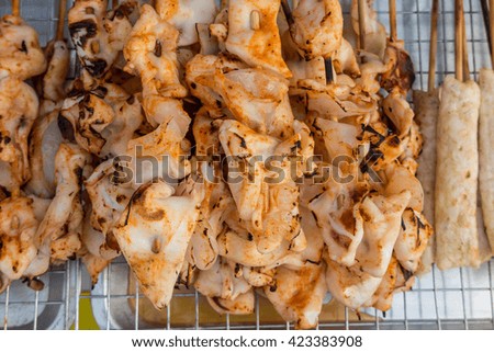 Grill squid at seafood market