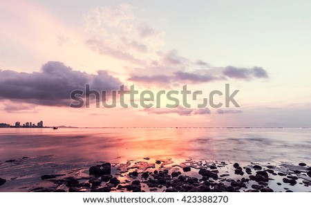 Beautiful sunset on the beach with sky.