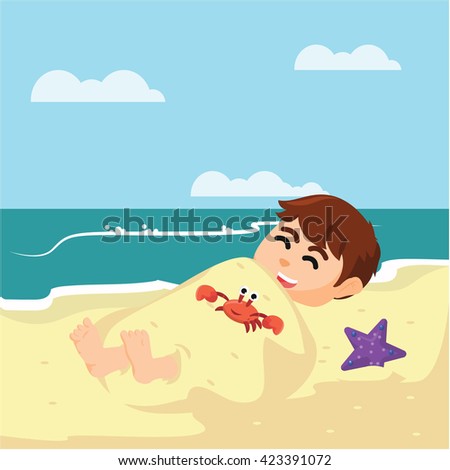 boy buried in sand