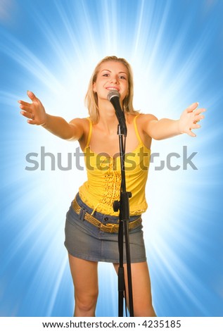 Singing young girl on abstract blue background