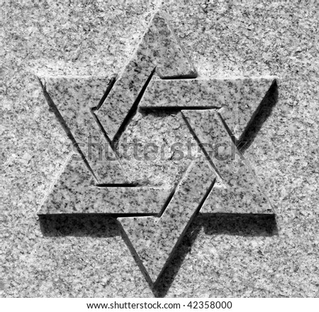 Black and white picture of star of David on the stone