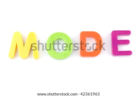 Word mode isolated on white background made from colorful toys letters